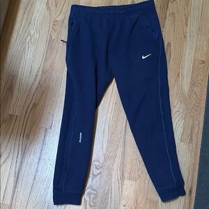 Nike Blue Sweatpants with Tapered Legs and Elastic Cuffs